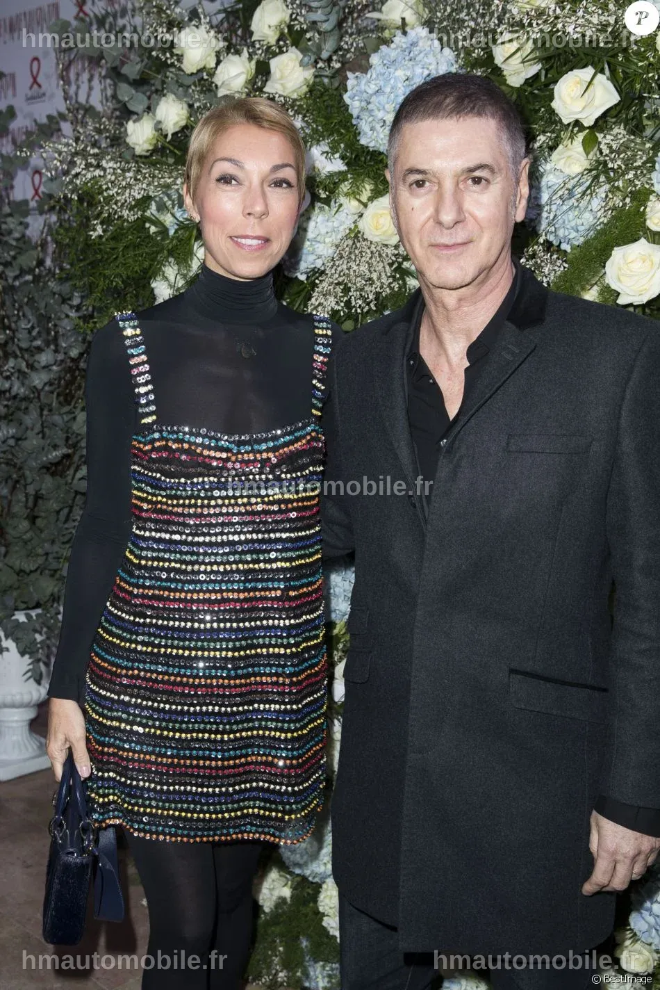 Dani et Étienne Daho posant ensemble lors d'une soirée Chanel.